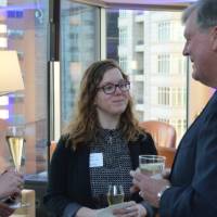 T.Haas talks with two alumnae